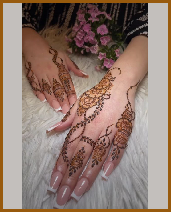 Crossline And Leaf Trail Aesthetic Back Hand Mehndi Design
